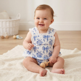 Blue Floral and Bow Print Apron Ruffle Romper