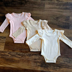 Evvie Bean's Basics Ruffle Onesie