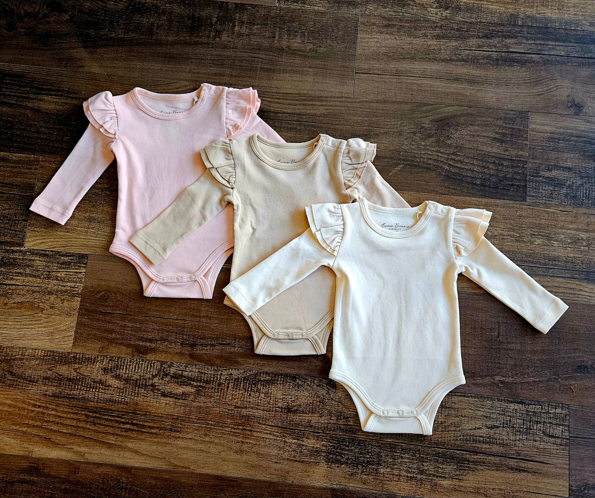 Evvie Bean's Basics Ruffle Onesie