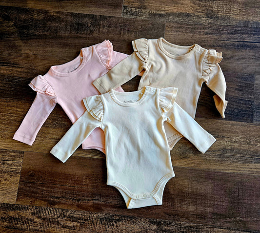 Evvie Bean's Basics Ruffle Onesie
