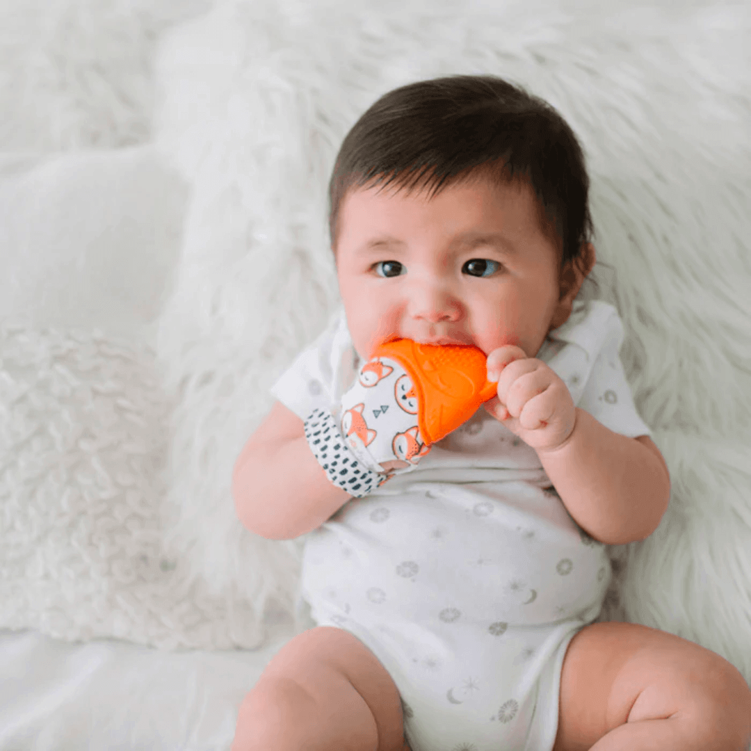 Itzy Mitt™ Silicone Teether Mitt - Fox - Evvie Bean's Baby Boutique