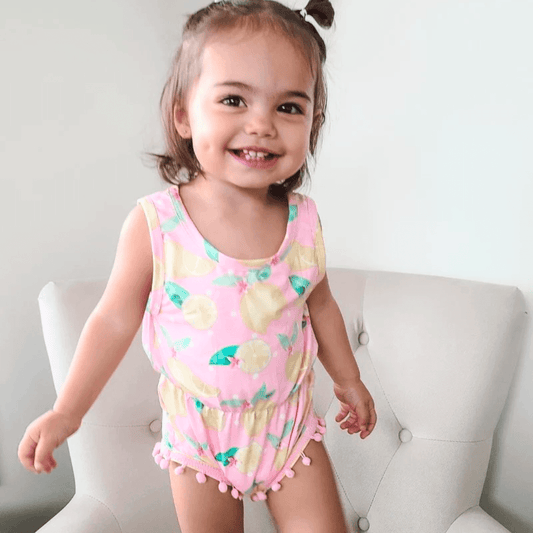 Pink Lemonade Pom Pom Romper - Evvie Bean's Baby Boutique