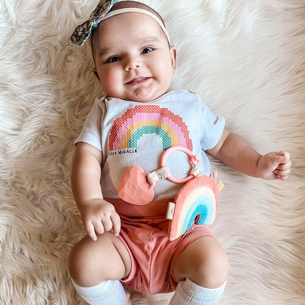 Itzy Pal™ Rainbow Plush + Teether - Evvie Bean's Baby Boutique